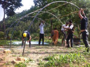 People making a temporary shelter