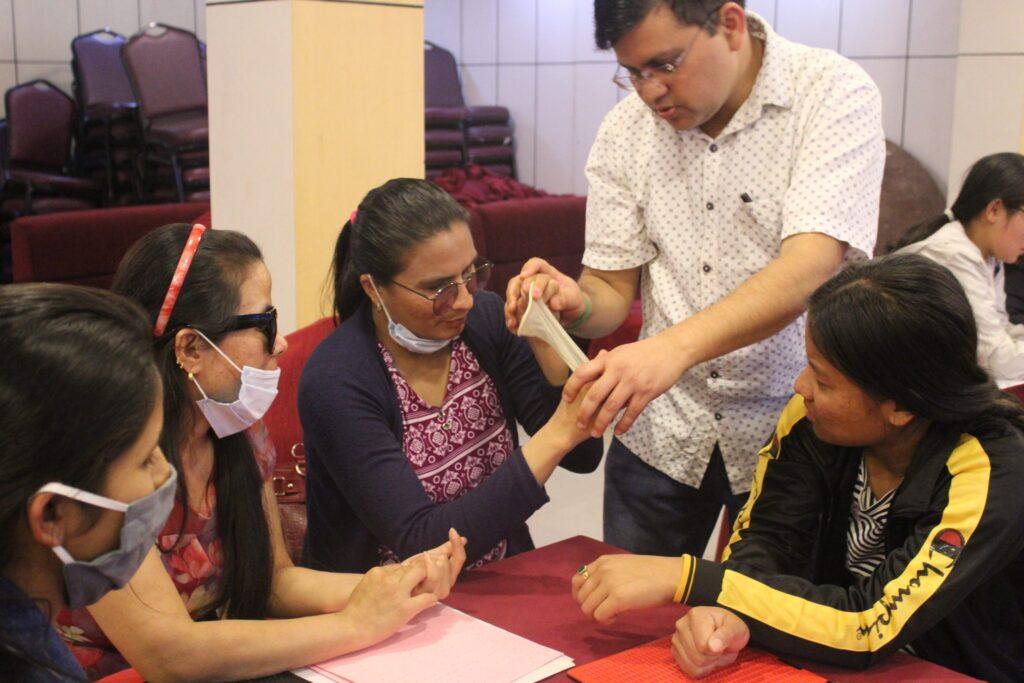 Participant exploring female condom